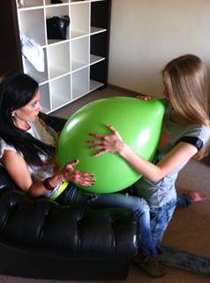 Girl pops balloons fetish video