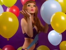 Austin White with helium balloons